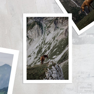 Fine art print of a horse standing on a Swiss mountain by Lara Baeriswyl - paper art print mockup
