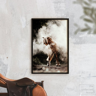 Fine art photography print of a Haflinger horse in a cloud of dust by Lara Baeriswyl - wall art print mockup with saddle