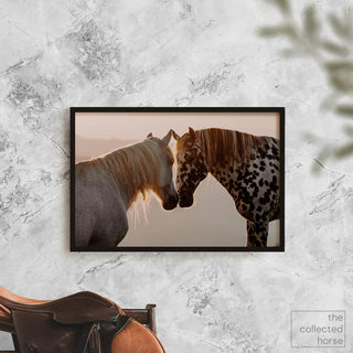 Horse art print of an Appaloosa and gray horse by Lara Baeriswyl - wall art print mockup with saddle
