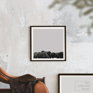 Minimalist equine photography art print of Thoroughbred yearlings in Saratoga by Kate Stephenson - framed wall art mockup with saddle