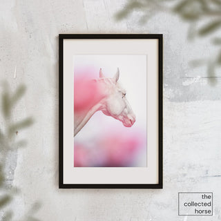 Fine art photography print of a white horse in a pastel scene by Carolin Felgner - framed wall art mockup