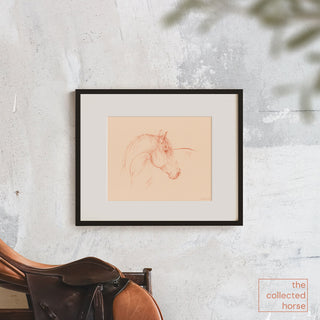 Soft warm equestrian art portrait drawing by Danielle Demers - framed wall art print mockup with saddle