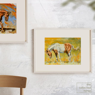 Colorful equine art print of a paint horse in a yellow field by Jennifer Pratt - framed wall art mockup